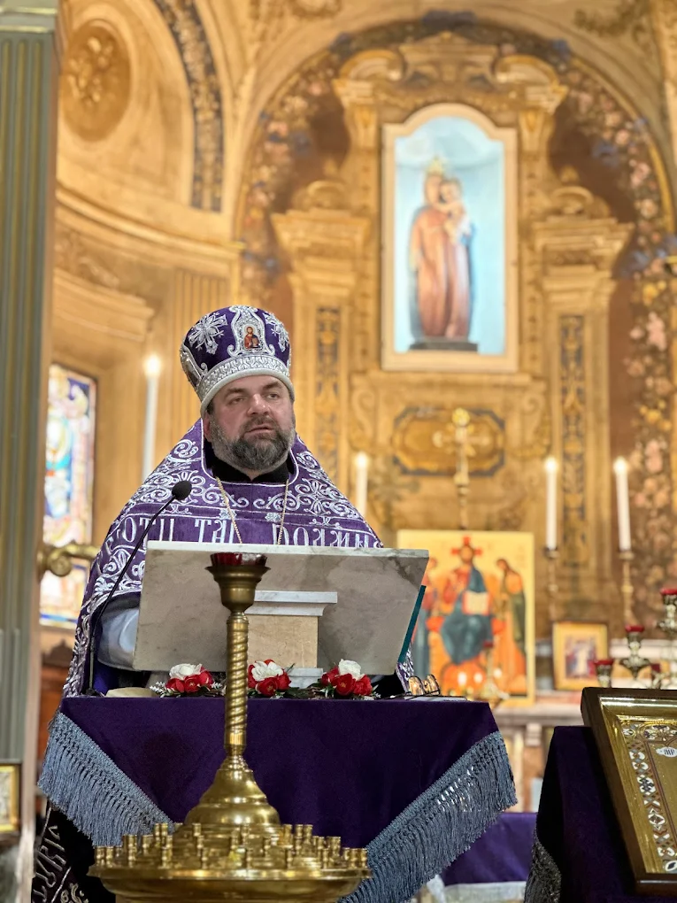portrait cu parohul Arcadie Porcescu