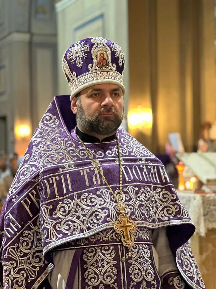 iamgine cu parohul comunității Arcadie Porcescu